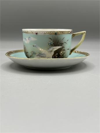 Antique Hand painted Teacup and Saucer