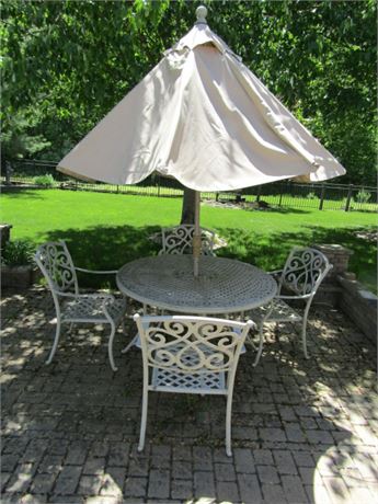 Wrought Iron Patio Table, Four Chairs, and Umbrella.